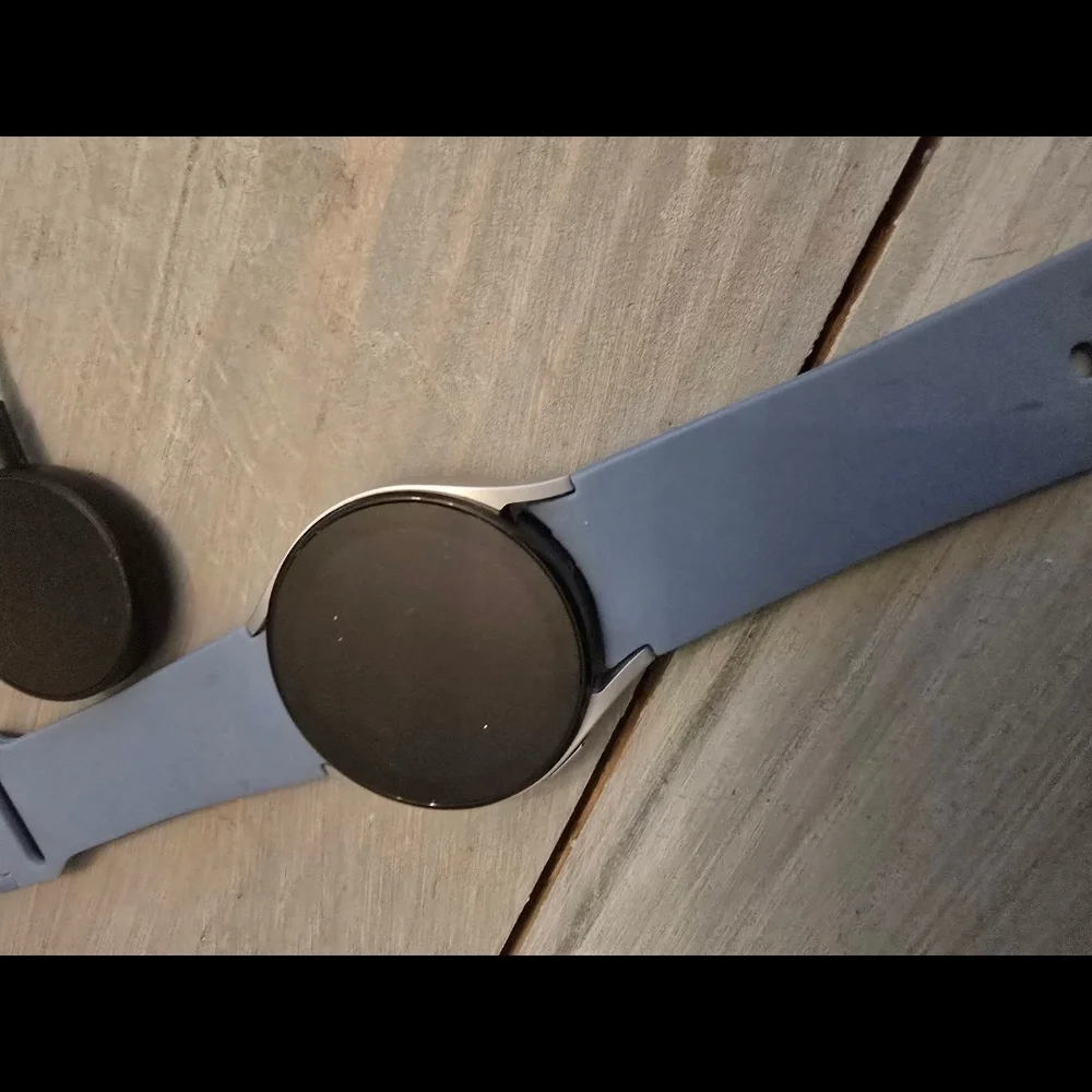 Samsung 5 Blue Smartwatch with Sleek Design and Digital Display